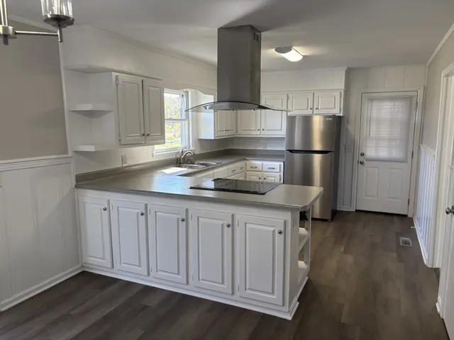 a view of a storage and utility room in a house