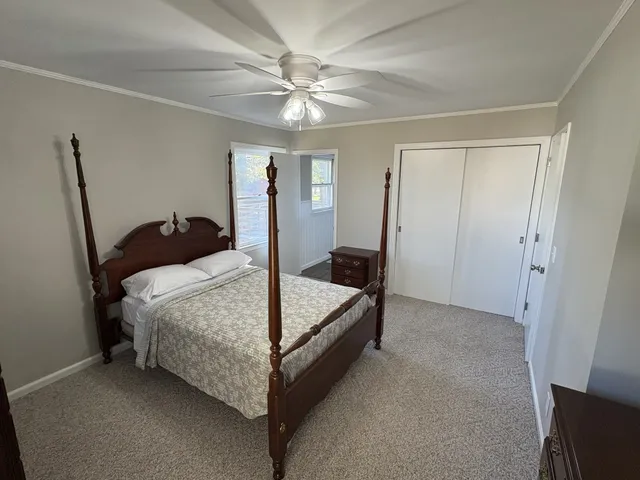 a bathroom with a toilet and a bathtub