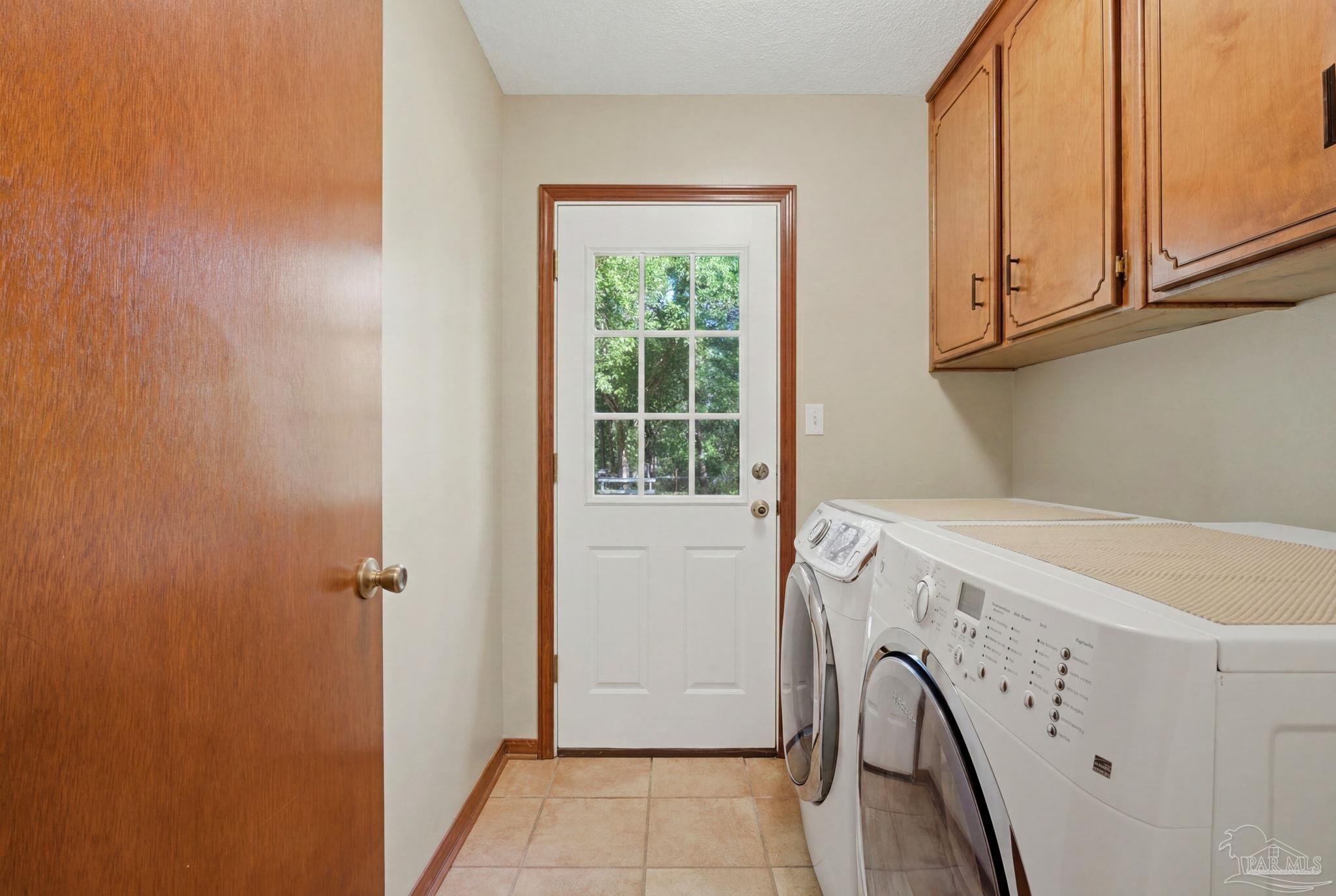 6870 Martin Road Milton, FL 32570 - Photo 36 of 48 a view of a storage & utility room with a window