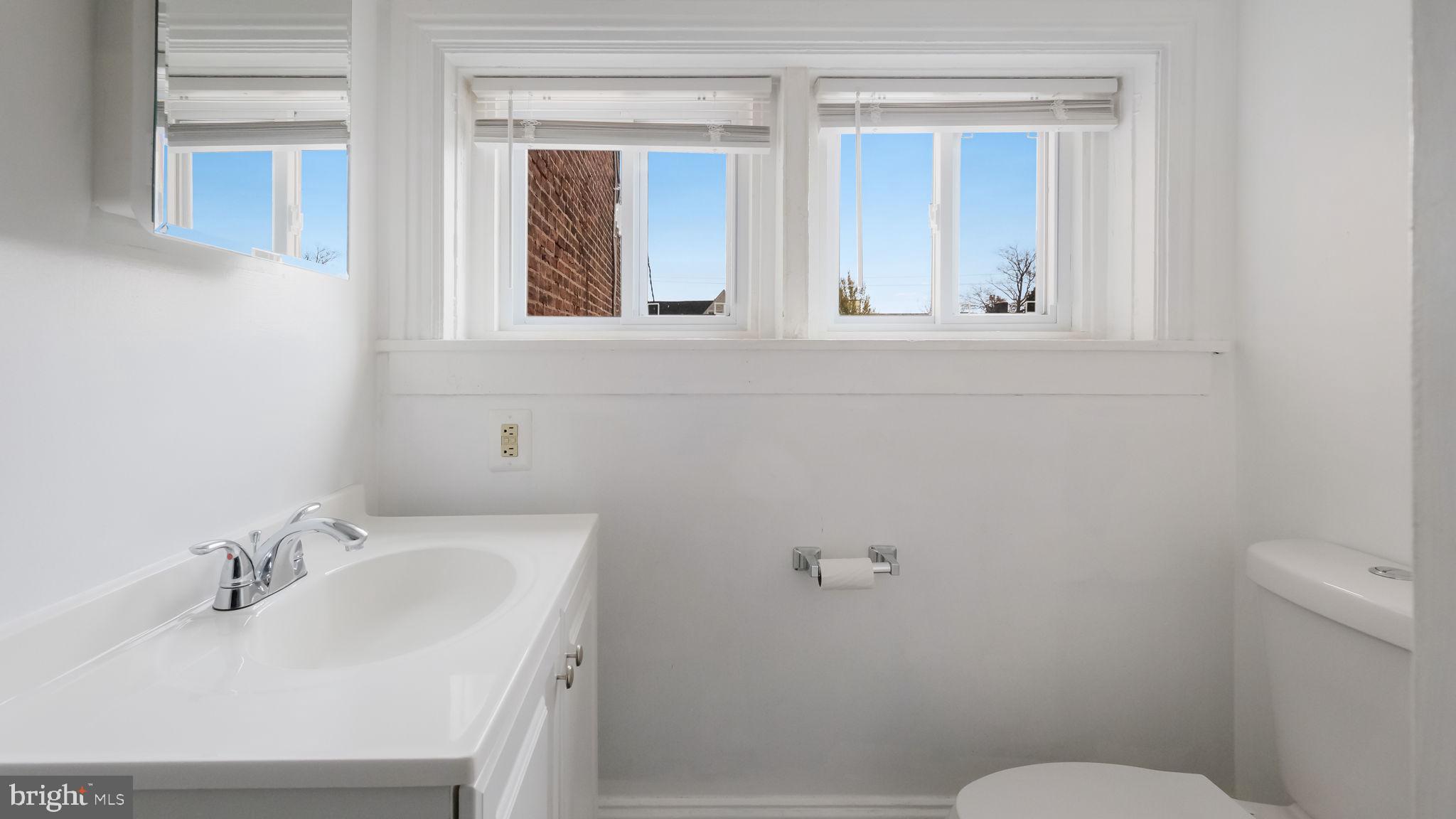 4 West State Street, Unit B Media, PA 19063 - Photo 13 of 14 a bathroom with a sink and a toilet