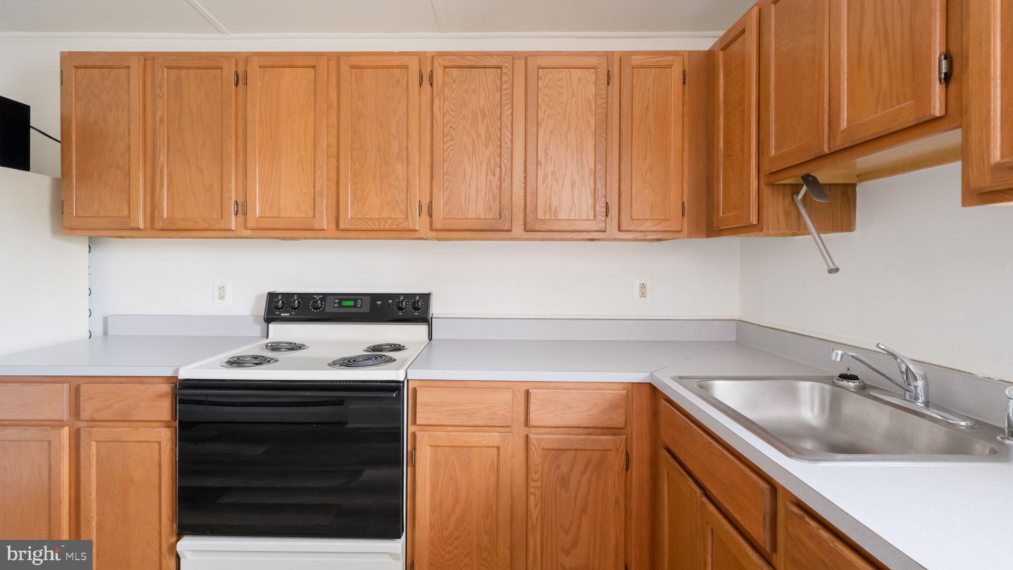 4 West State Street, Unit B Media, PA 19063 - Photo 10 of 14 a kitchen with appliances cabinets and a sink