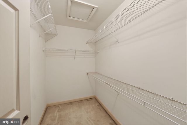 a view of small space with racks on the wall