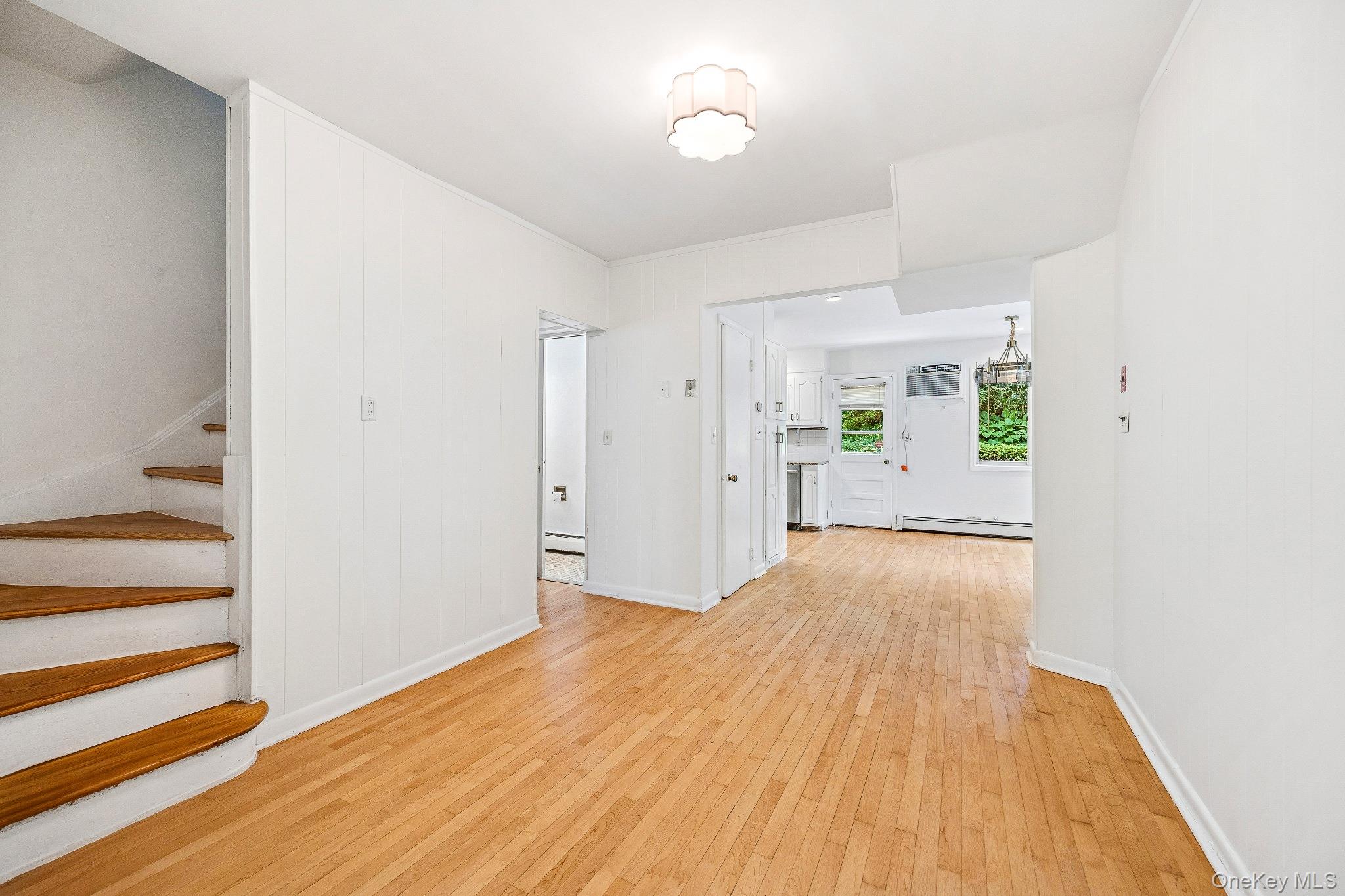 10 River Road Scarsdale, NY 10583 - Photo 7 of 20 Family room open to kitchen and formal dinning room