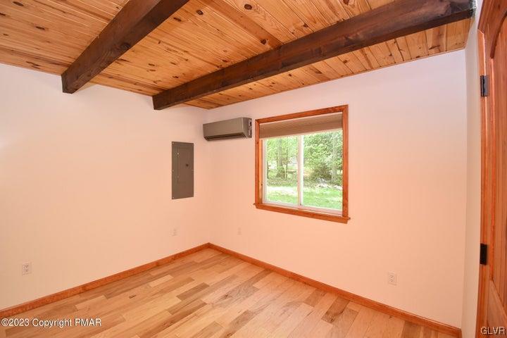 1239 Glenbrook Road Bartonsville, PA 18321 - Photo 19 of 32 a view of a backyard with a large window