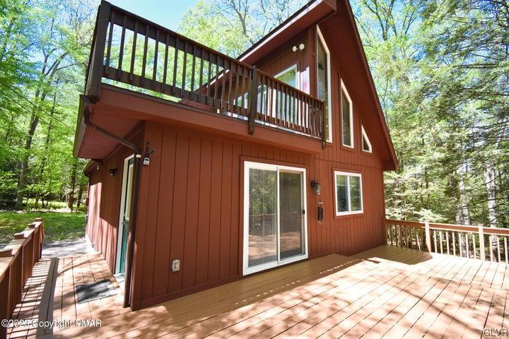 1239 Glenbrook Road Bartonsville, PA 18321 - Photo 3 of 32 a view of a house with a wooden fence