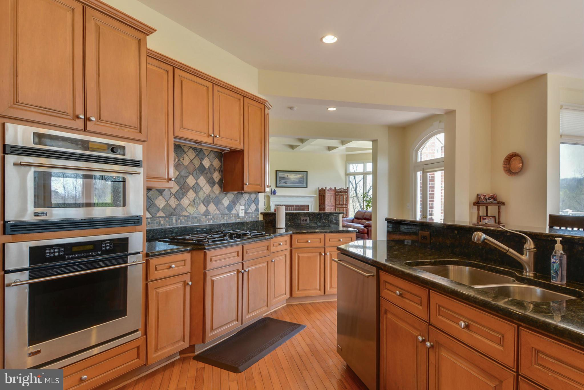 17086 Winning Colors Place Leesburg, VA 20176 - Photo 11 of 29 Kitchen prior to new floors and paint