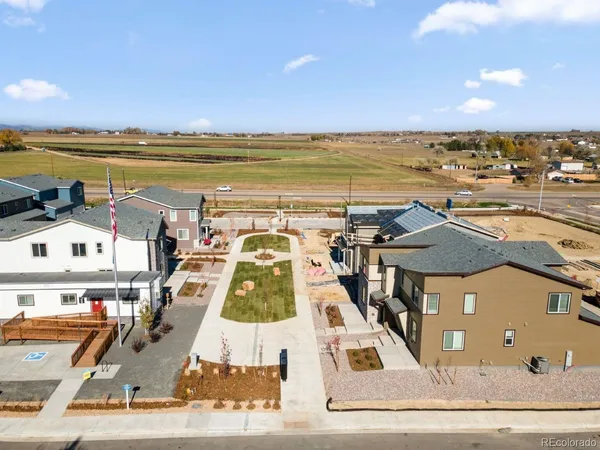 a view of a city with an ocean view