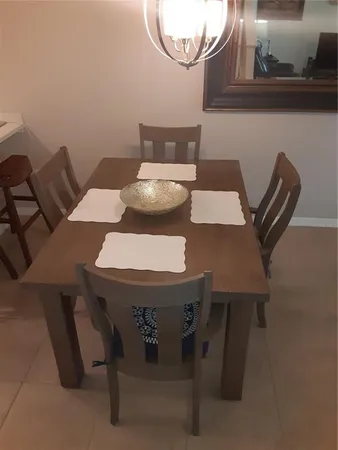 a view of a dining room with furniture