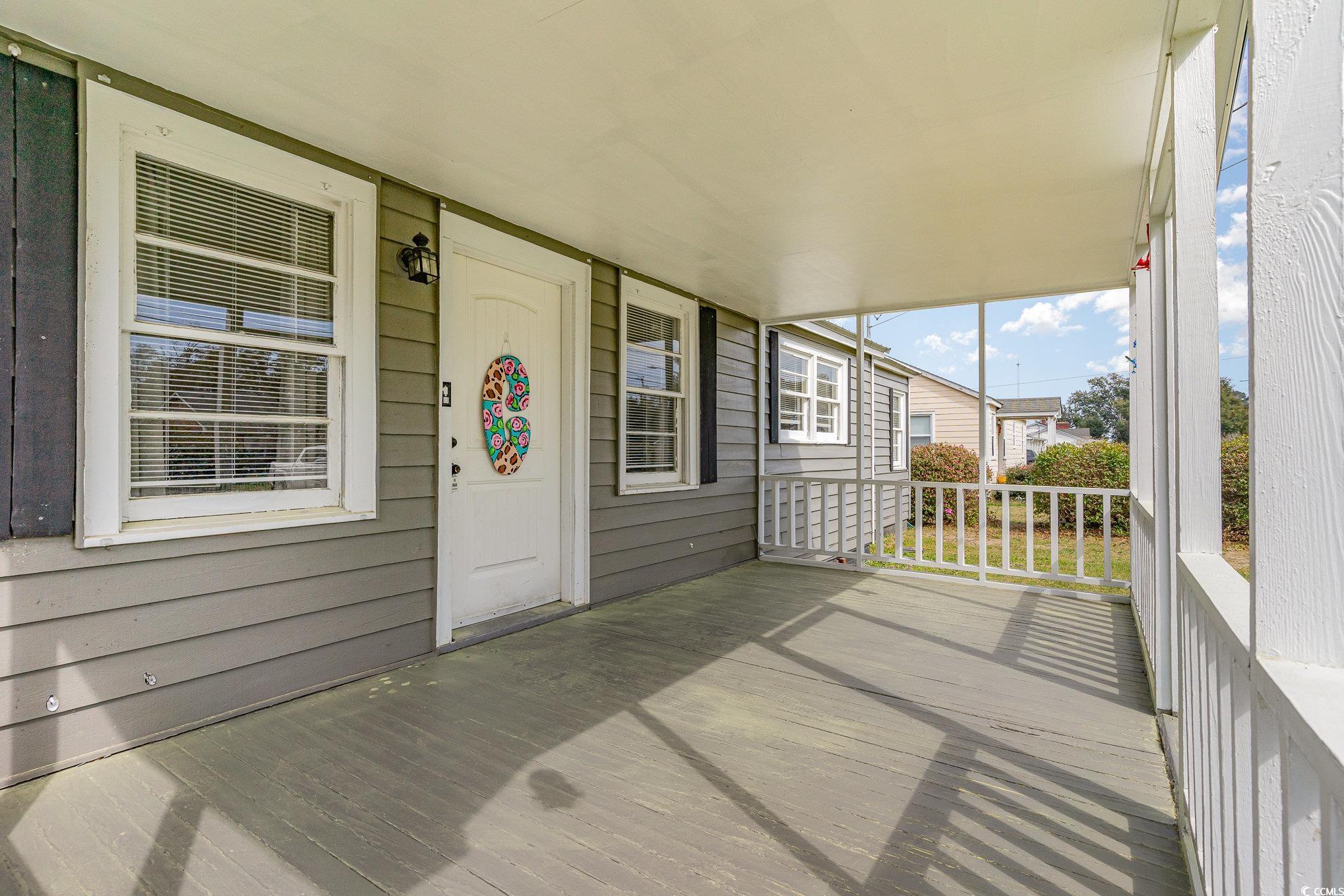606 Britt Street Georgetown, SC 29440 - Photo 2 of 28 Deck featuring covered porch