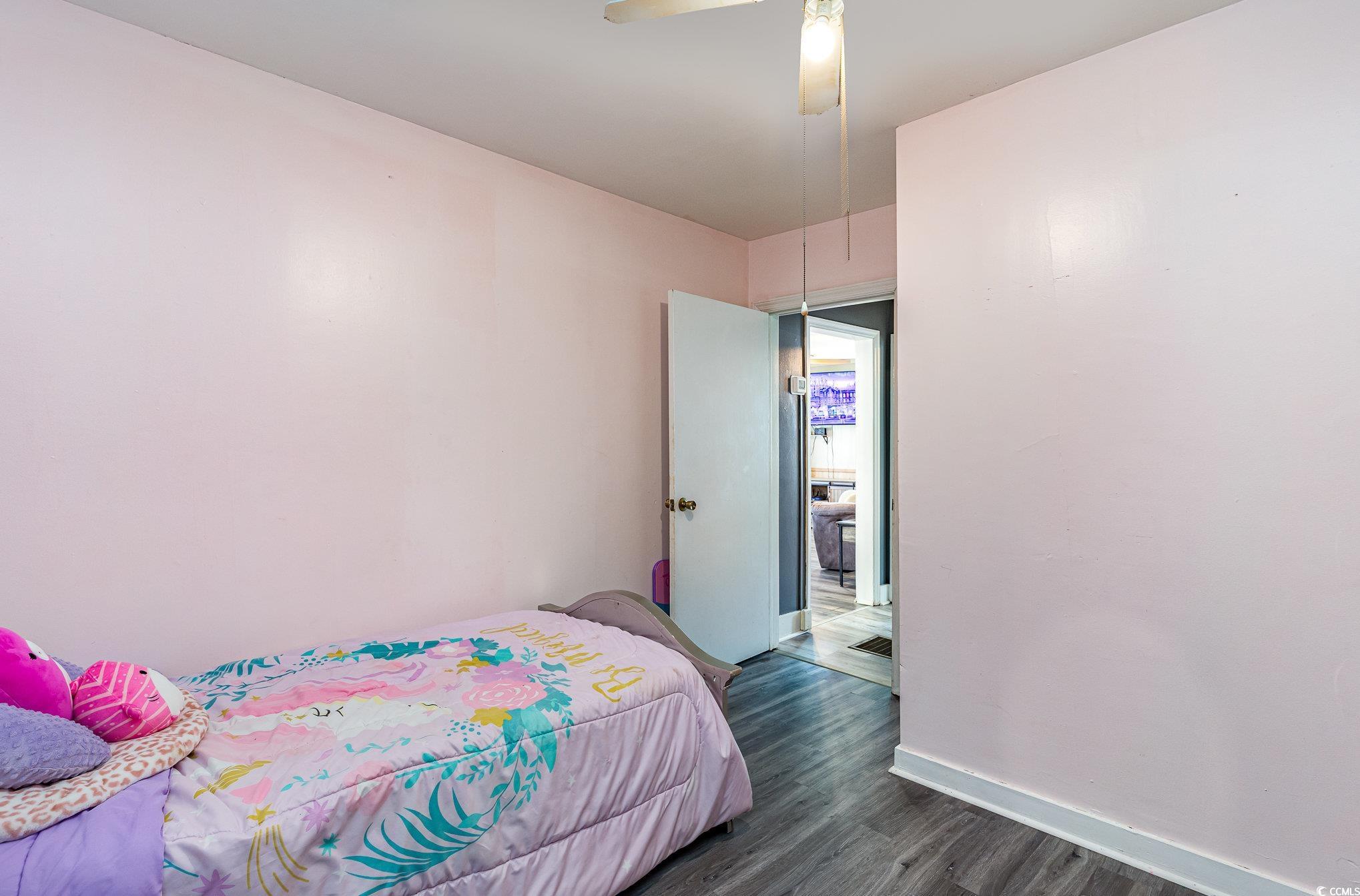606 Britt Street Georgetown, SC 29440 - Photo 21 of 28 Bedroom featuring dark wood-style floors, ceiling
