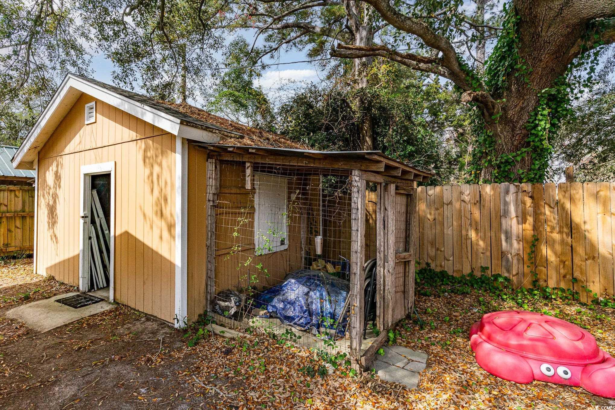 606 Britt Street Georgetown, SC 29440 - Photo 27 of 28 View of poultry coop featuring fence