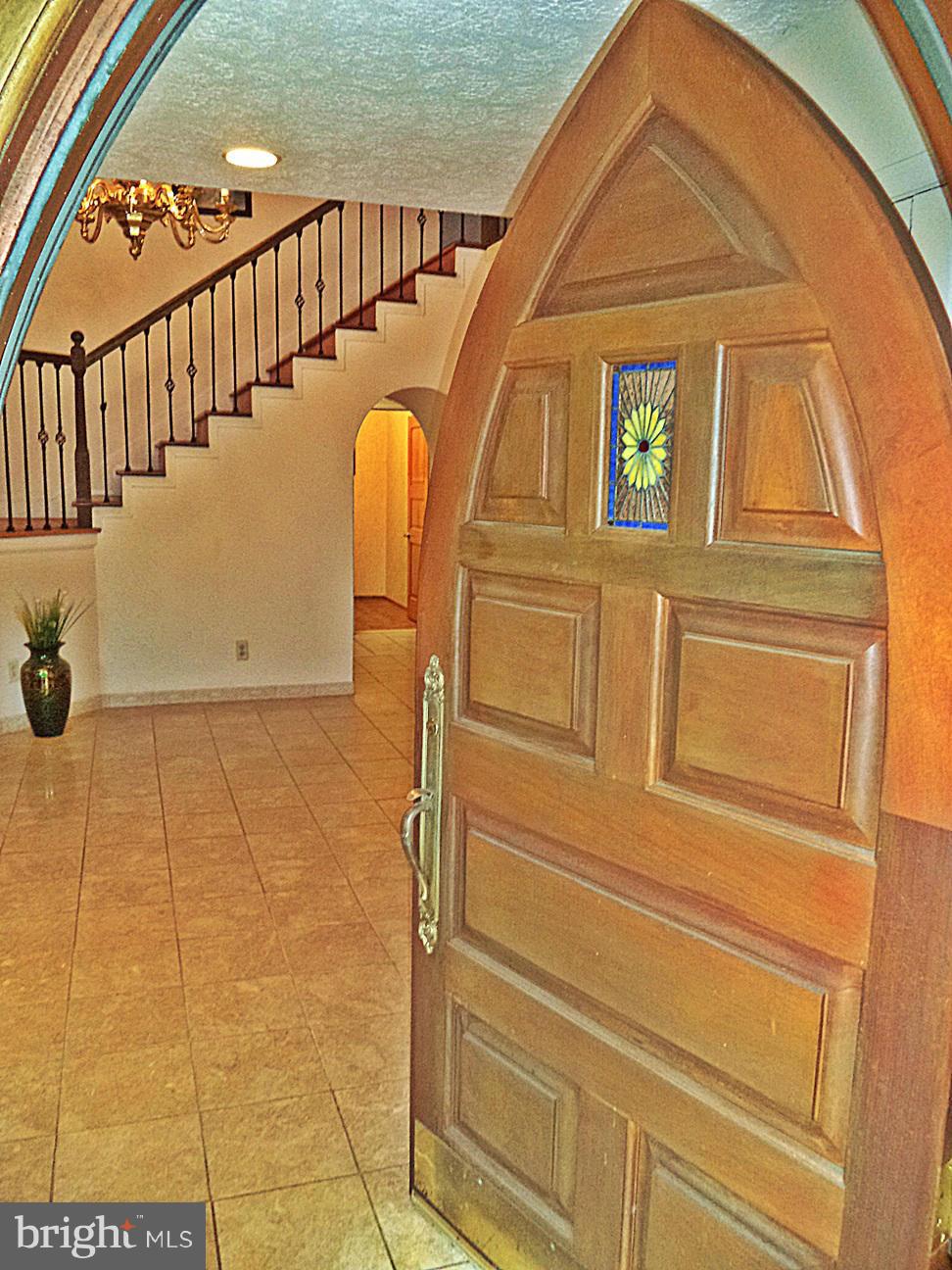 360 Jones Station Road Arnold, MD 21012 - Photo 4 of 30 CUSTOM-ARCHED COVERED ENTRY WELCOMES ALL !