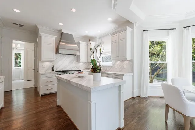 a living room with furniture a fireplace and a fireplace