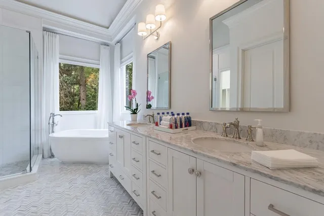 a view of a livingroom with furniture and a chandelier