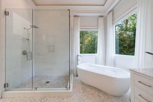 a kitchen with stainless steel appliances granite countertop a refrigerator sink and stove