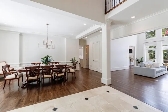 a living room with furniture fireplace and flat screen tv