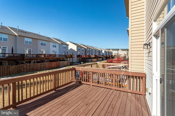 a view of balcony with furniture