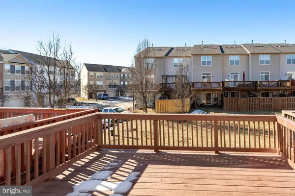 a view of a brick building from a balcony