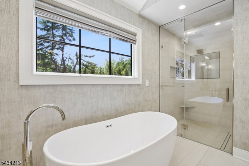 210 Mendham Road Bernardsville, NJ 07924 - Photo 29 of 45 a white bath tub sitting next to a window