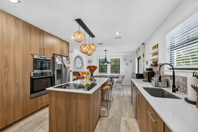 a spacious bedroom with a bed and a couch