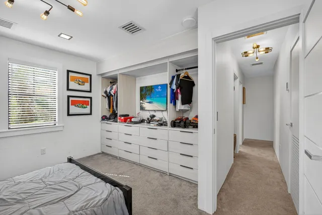 a view of a yard with swimming pool