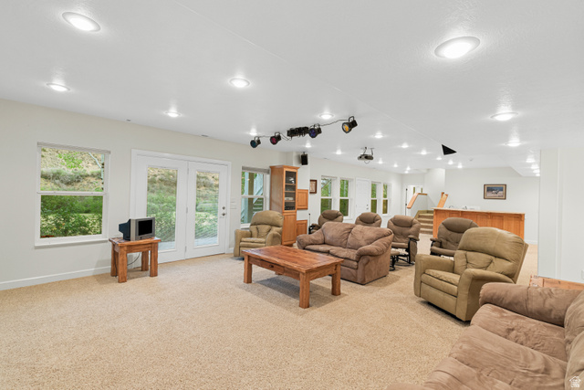 1133 Paris Canyon Road Paris, ID 83261 - Photo 35 of 74 Spacious lower-level room featuring plush carpet flooring, recessed lighting, and multiple windows