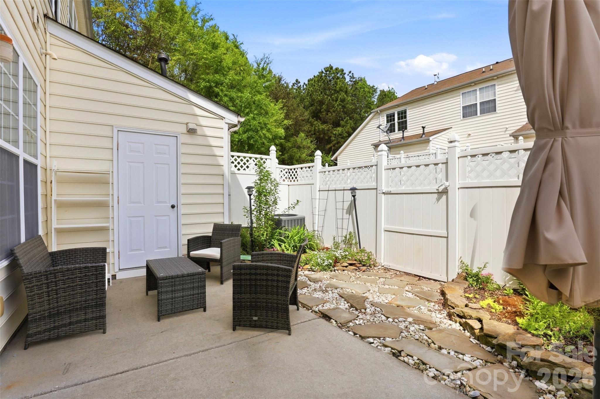 532 Bent Leaf Court Fort Mill, SC 29708 - Photo 25 of 27 a view of a house with backyard and sitting area
