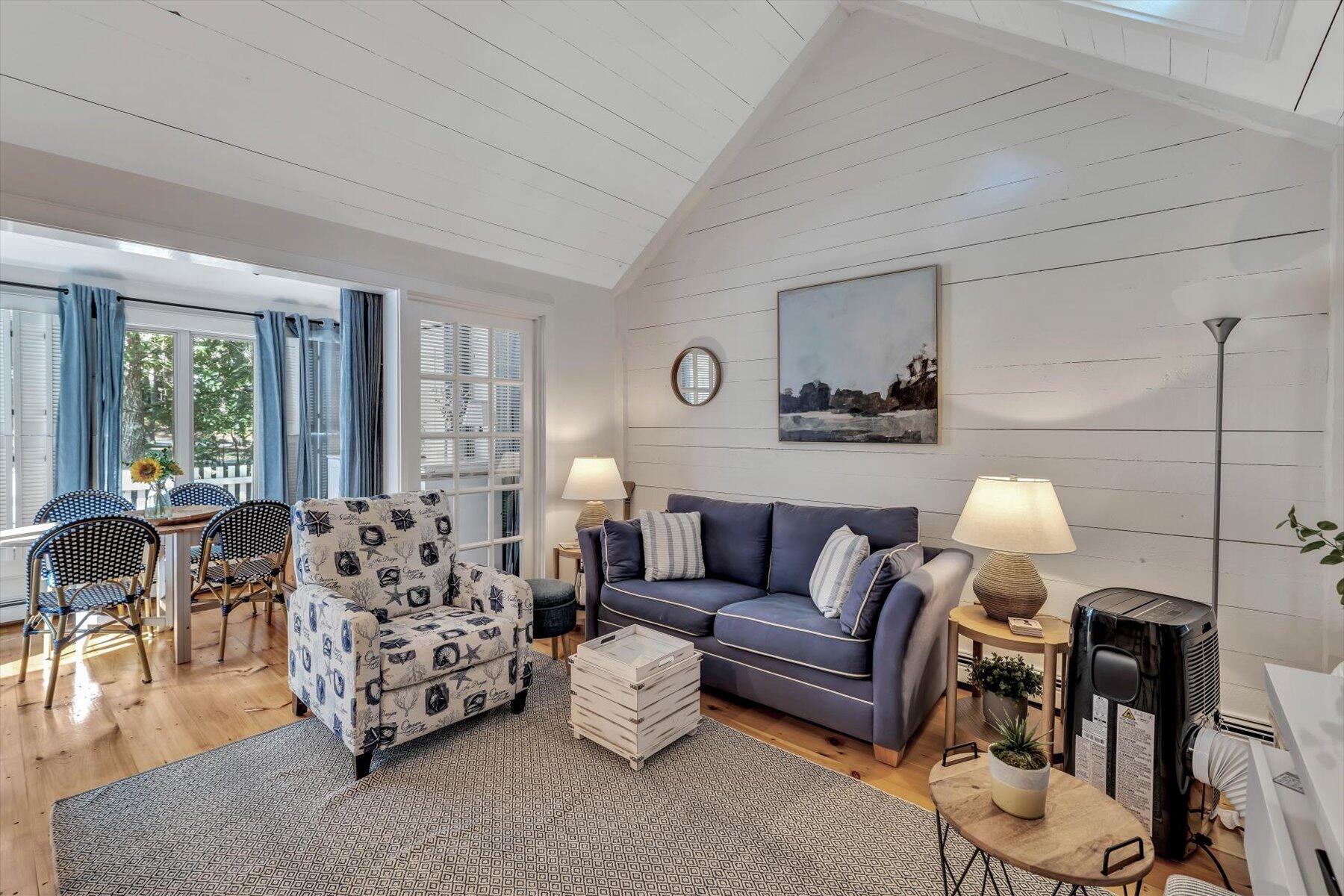 36 Brant Rock Road Mashpee, MA 02649 - Photo 5 of 23 a living room with furniture and a large window