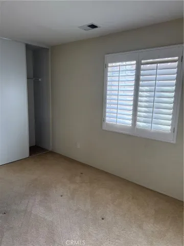 a bathroom with a granite countertop toilet a sink and bathtub