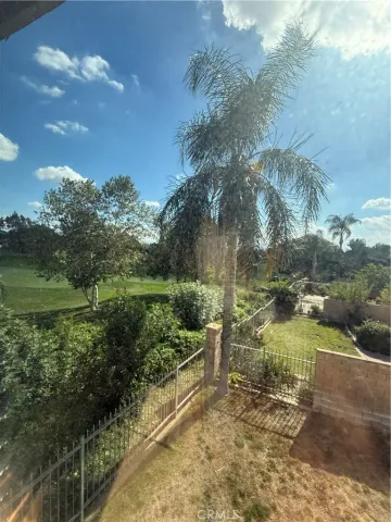 a view of a lake with a yard