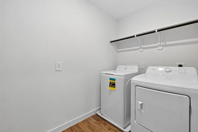 a view of a house with yard and front view of a house