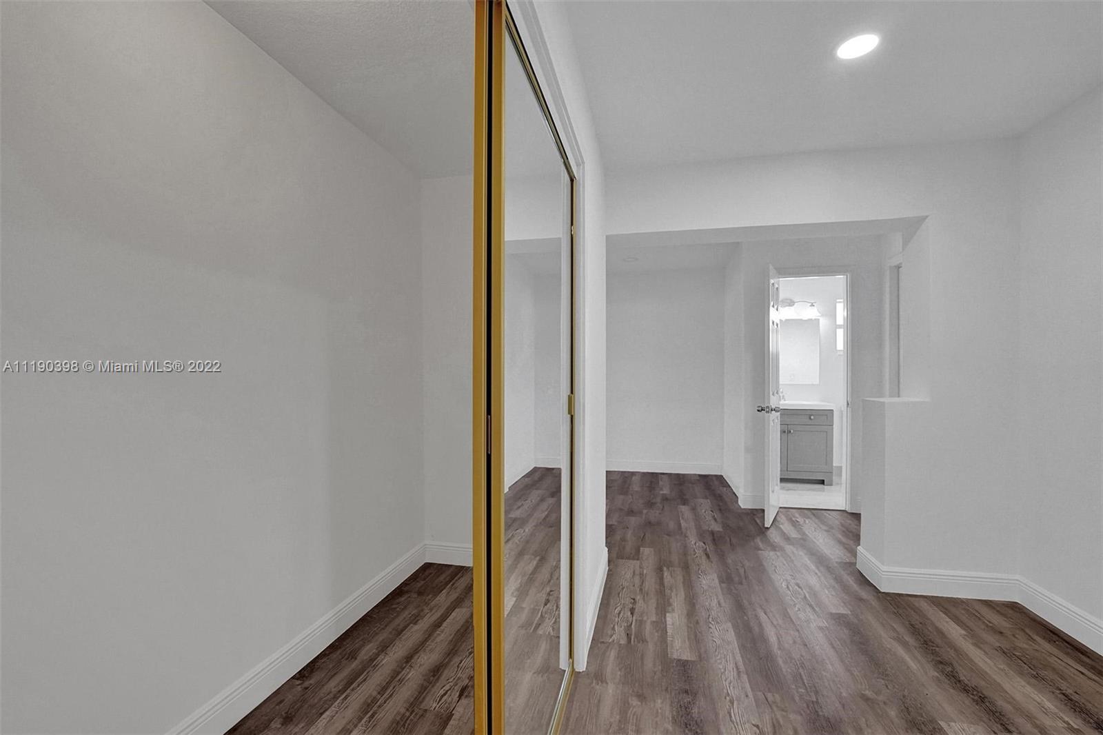 730 Northwest 18th Street Pompano Beach, FL 33060 - Photo 22 of 56 a view of entryway with wooden floor