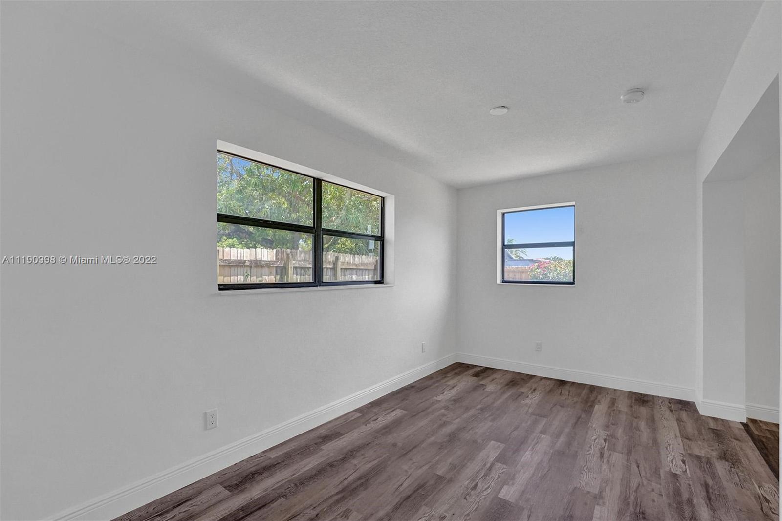 730 Northwest 18th Street Pompano Beach, FL 33060 - Photo 28 of 56 an empty room with a window