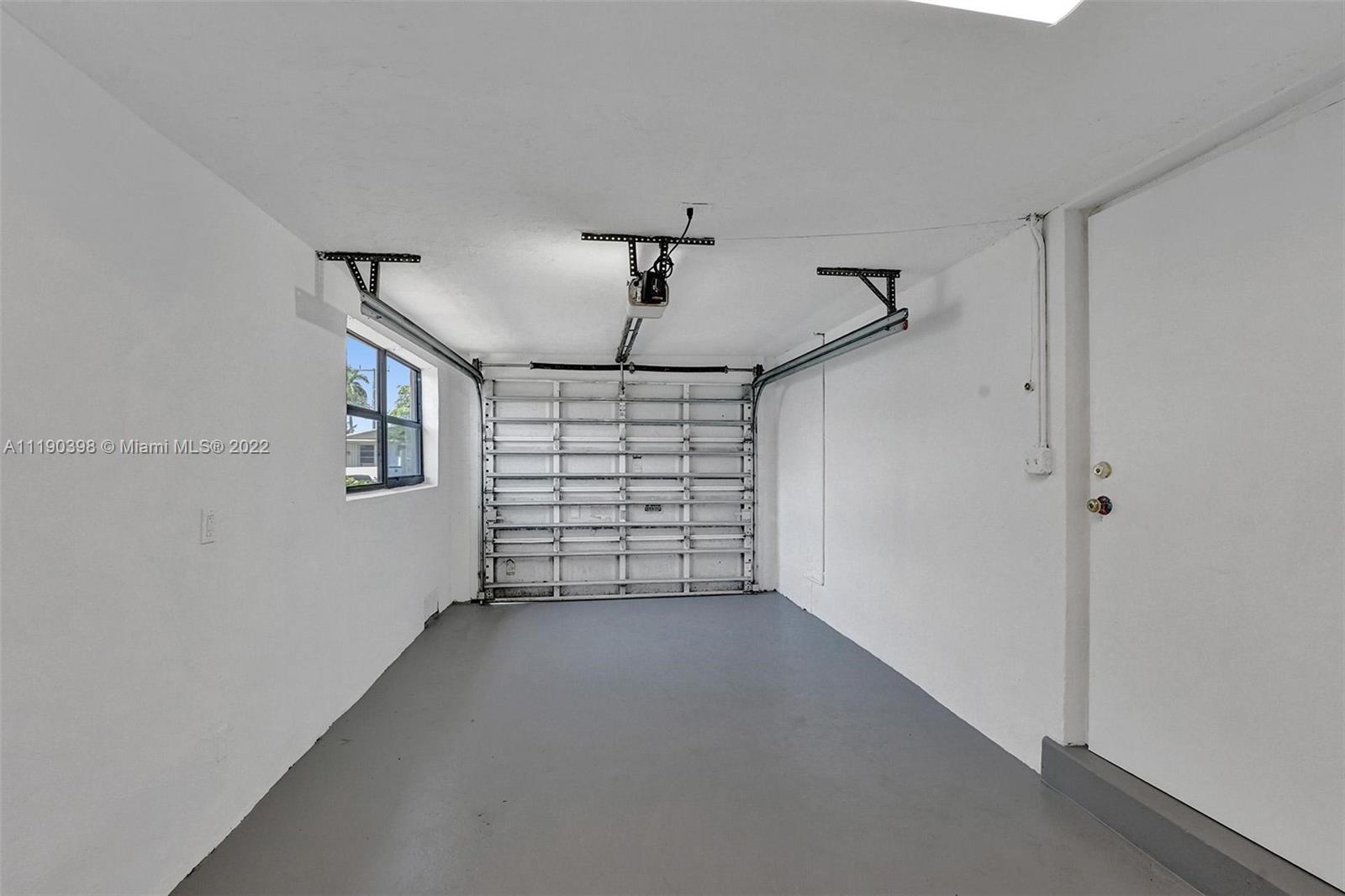 730 Northwest 18th Street Pompano Beach, FL 33060 - Photo 50 of 56 a view of a big room with closet and windows