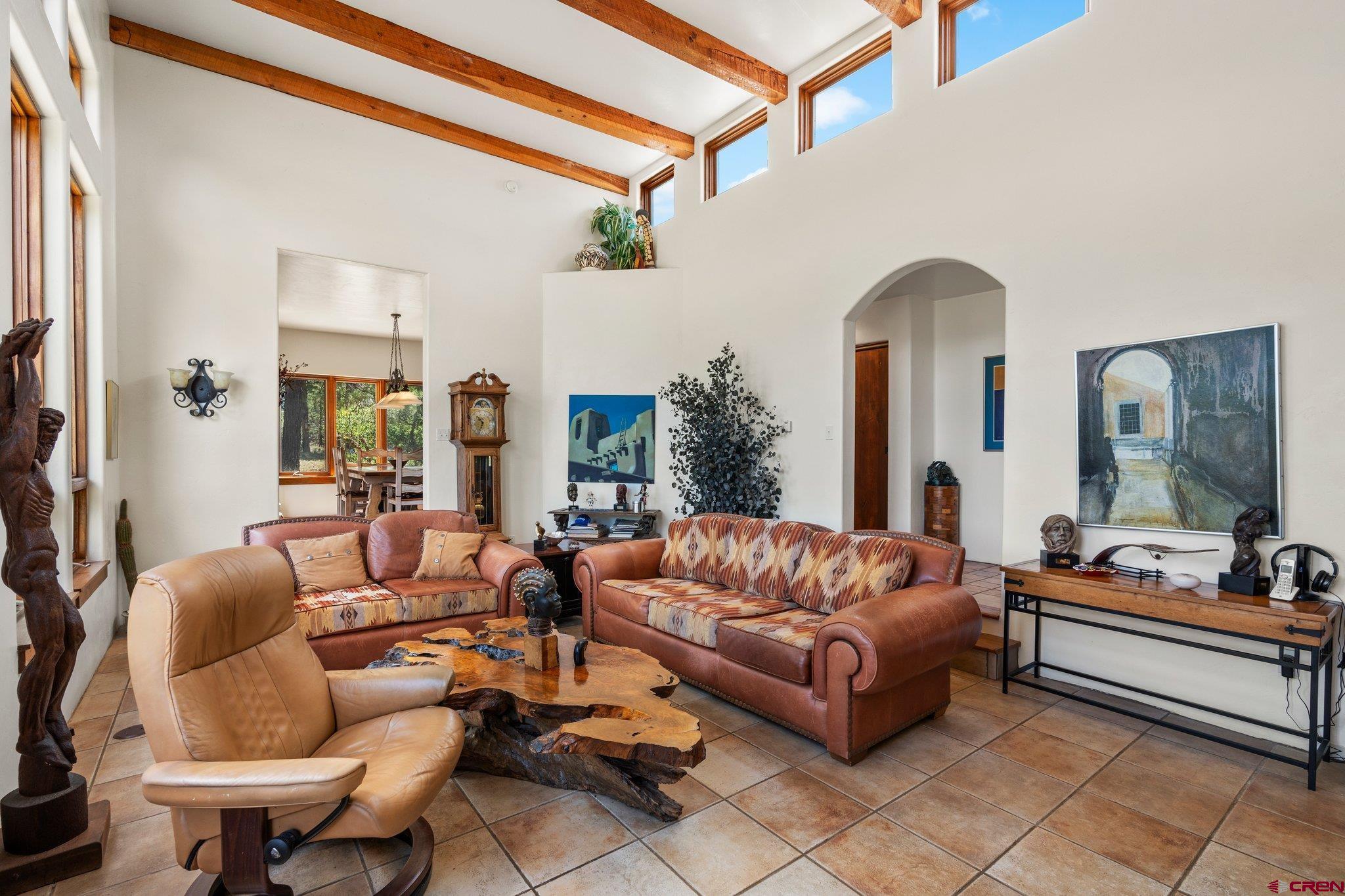 285 South Fork Road Durango, CO 81303 - Photo 12 of 31 a living room with furniture and a large window