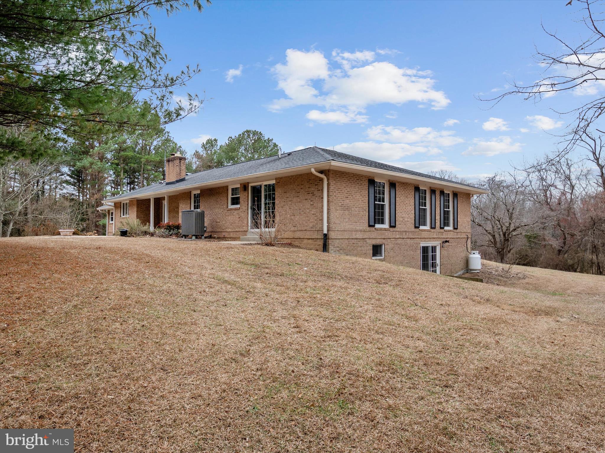 6520 Briscoe Turn Road Owings, MD 20736 - Photo 54 of 70 a front view of a house with a yard
