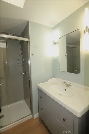 a bathroom with a shower and a bathtub