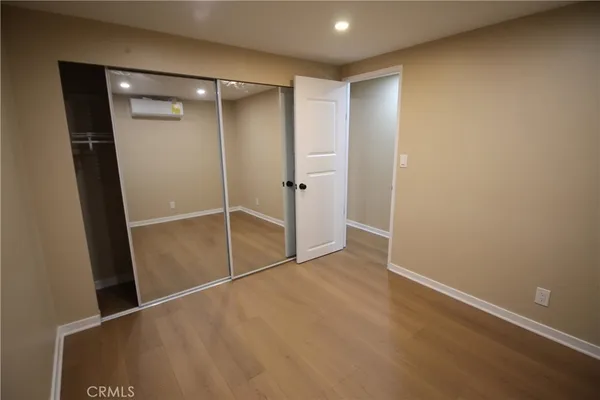 a view of a room with rack on the wall