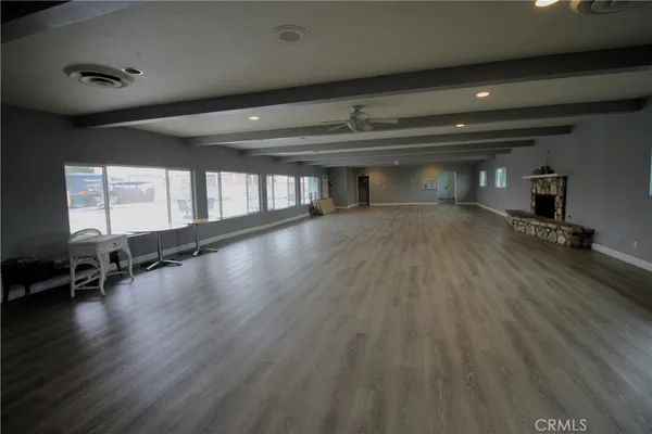 a view of kitchen with wooden floor