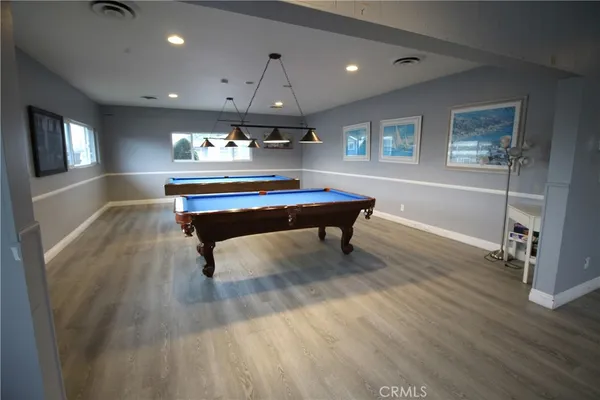 a front view of a house with a street