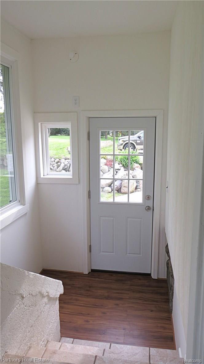 4524 Pinckney Road Howell, MI 48843 - Photo 14 of 58 10c.Additional Entrance-room off Back southside of home