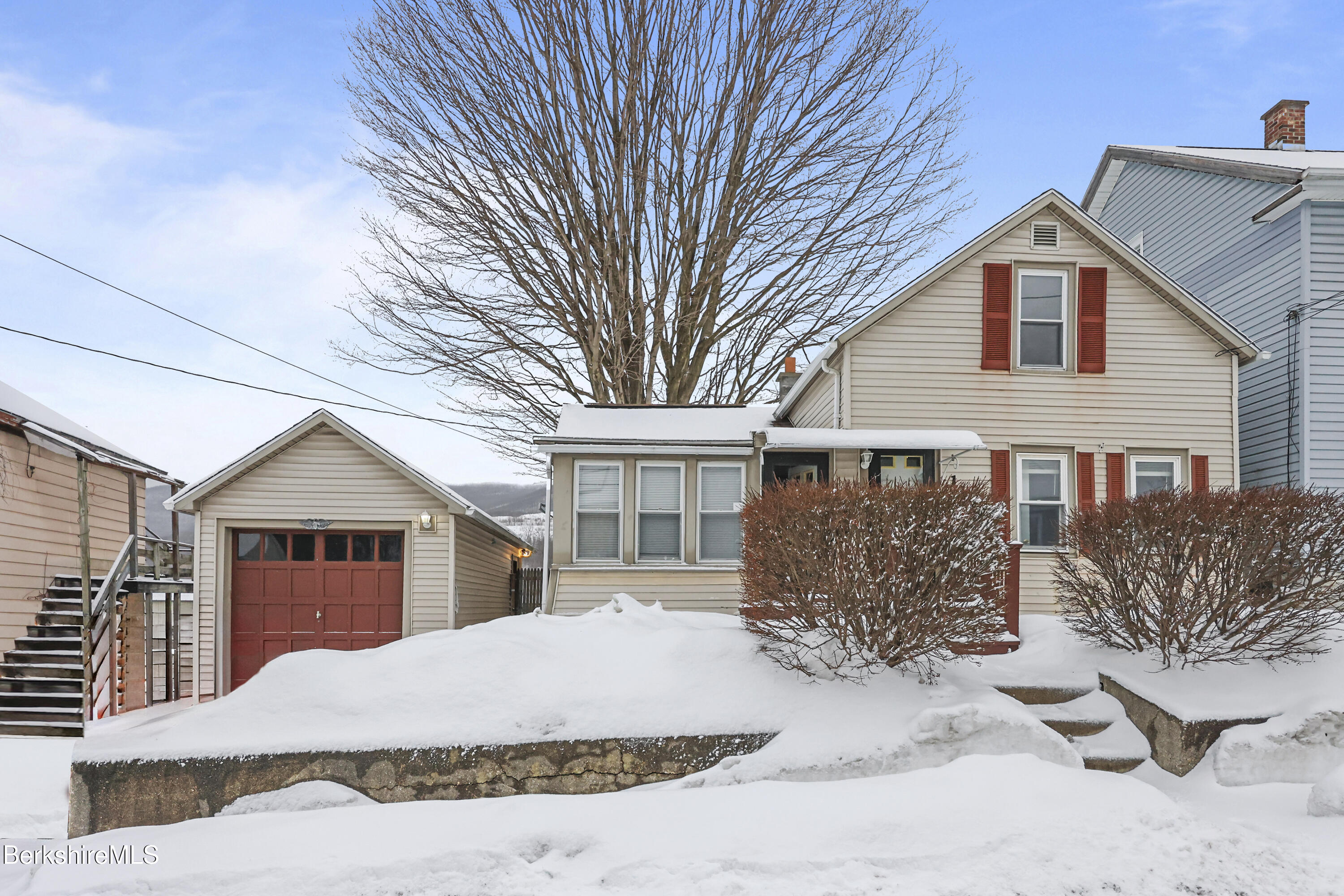 176 North Summer Street Adams, MA 01220 - Photo 1 of 31 a front view of a house with a yard