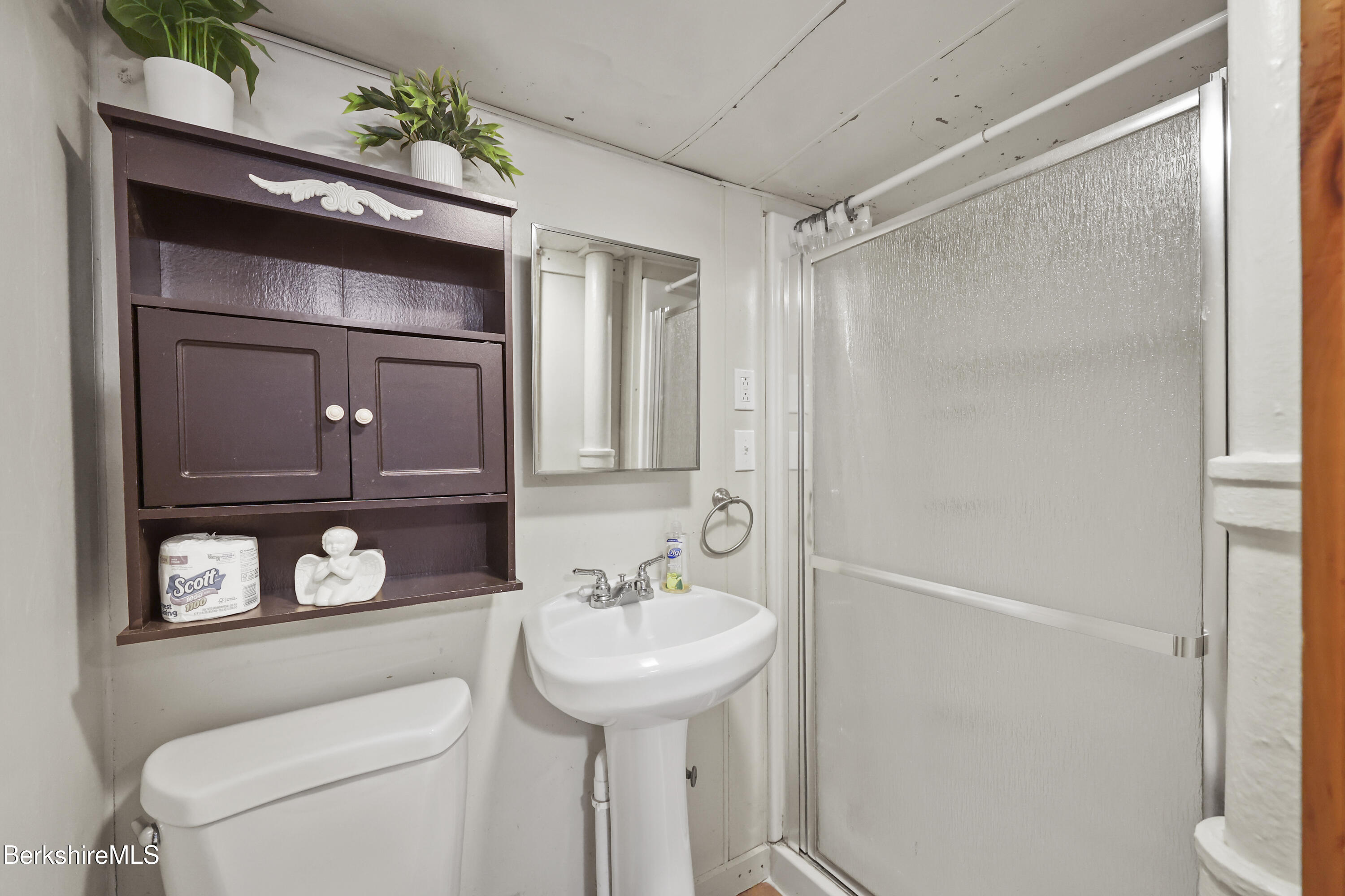 176 North Summer Street Adams, MA 01220 - Photo 13 of 31 a bathroom with a toilet sink and mirror