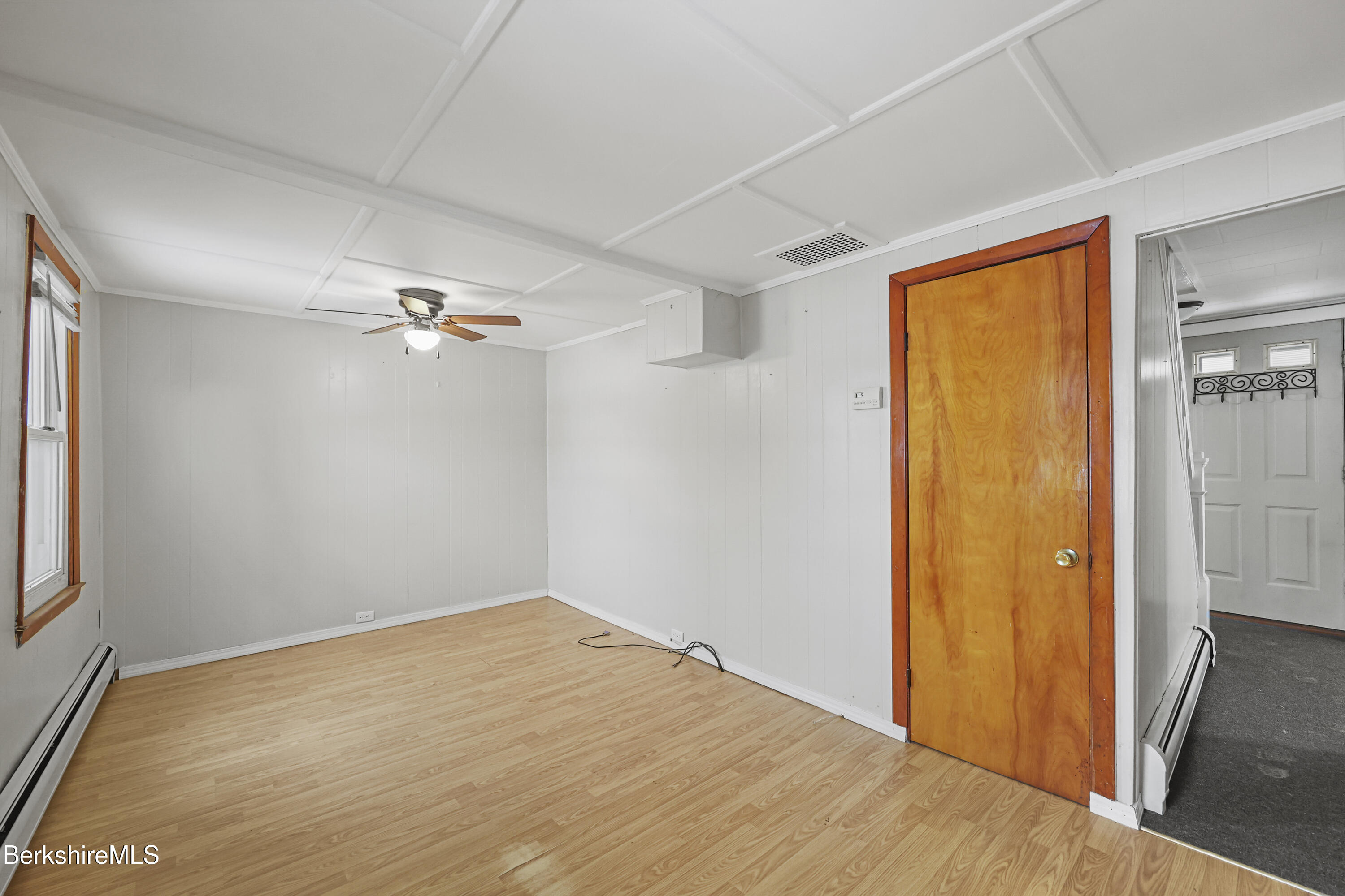 176 North Summer Street Adams, MA 01220 - Photo 14 of 31 a view of empty room with wooden floor and fan