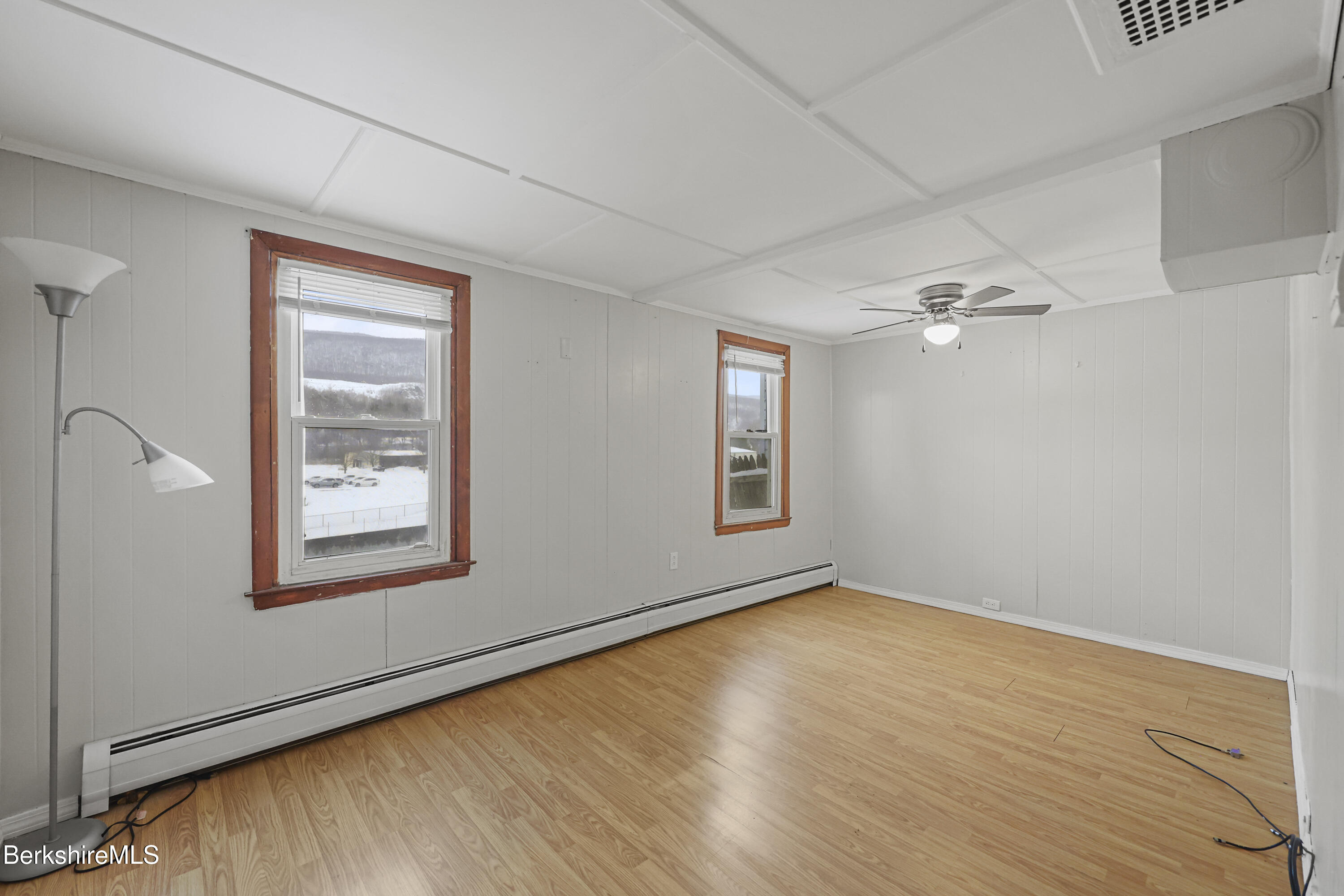 176 North Summer Street Adams, MA 01220 - Photo 15 of 31 a view of an empty room with a window and wooden floor