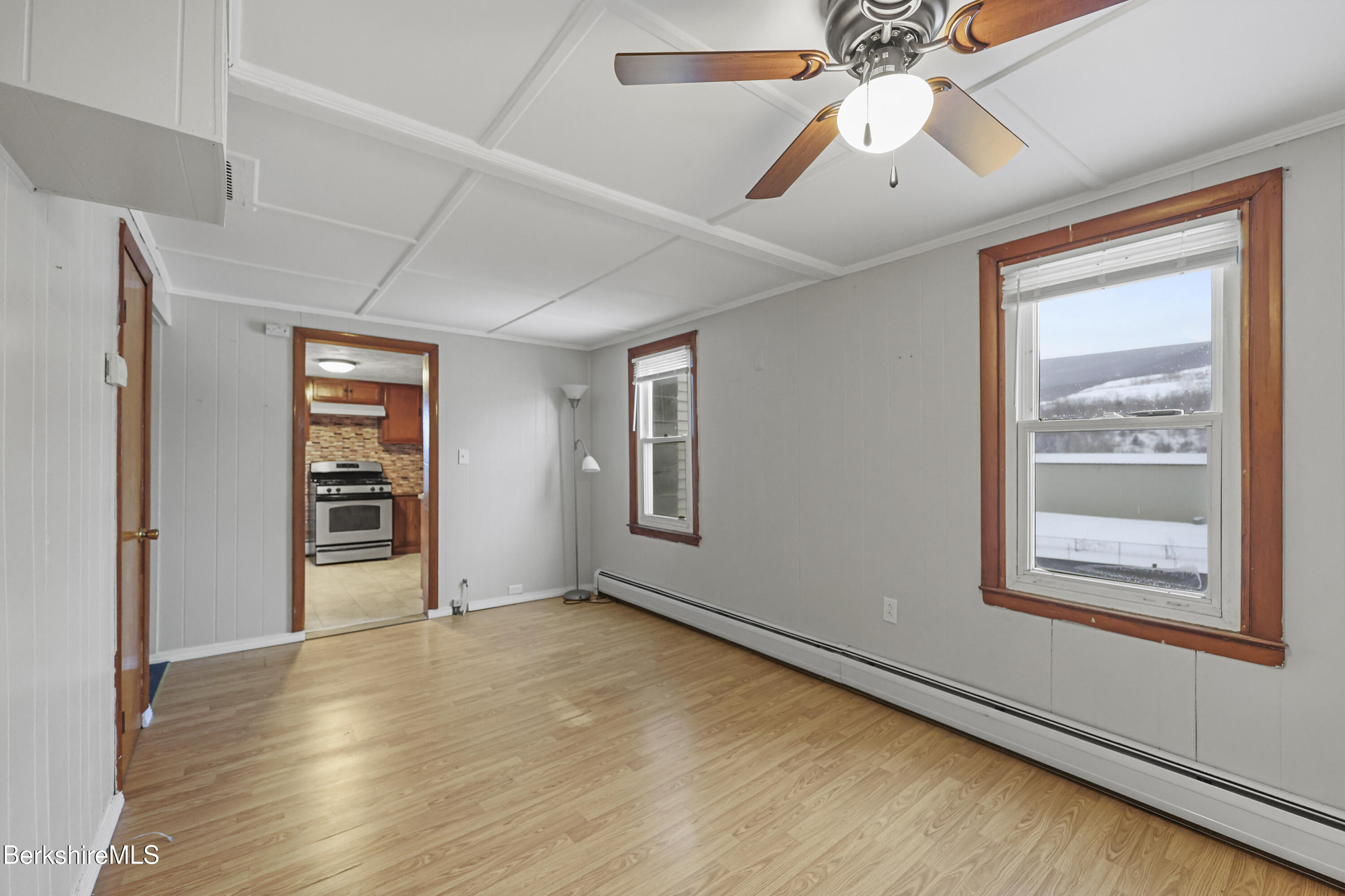 176 North Summer Street Adams, MA 01220 - Photo 16 of 31 a view of an empty room with a window and wooden floor
