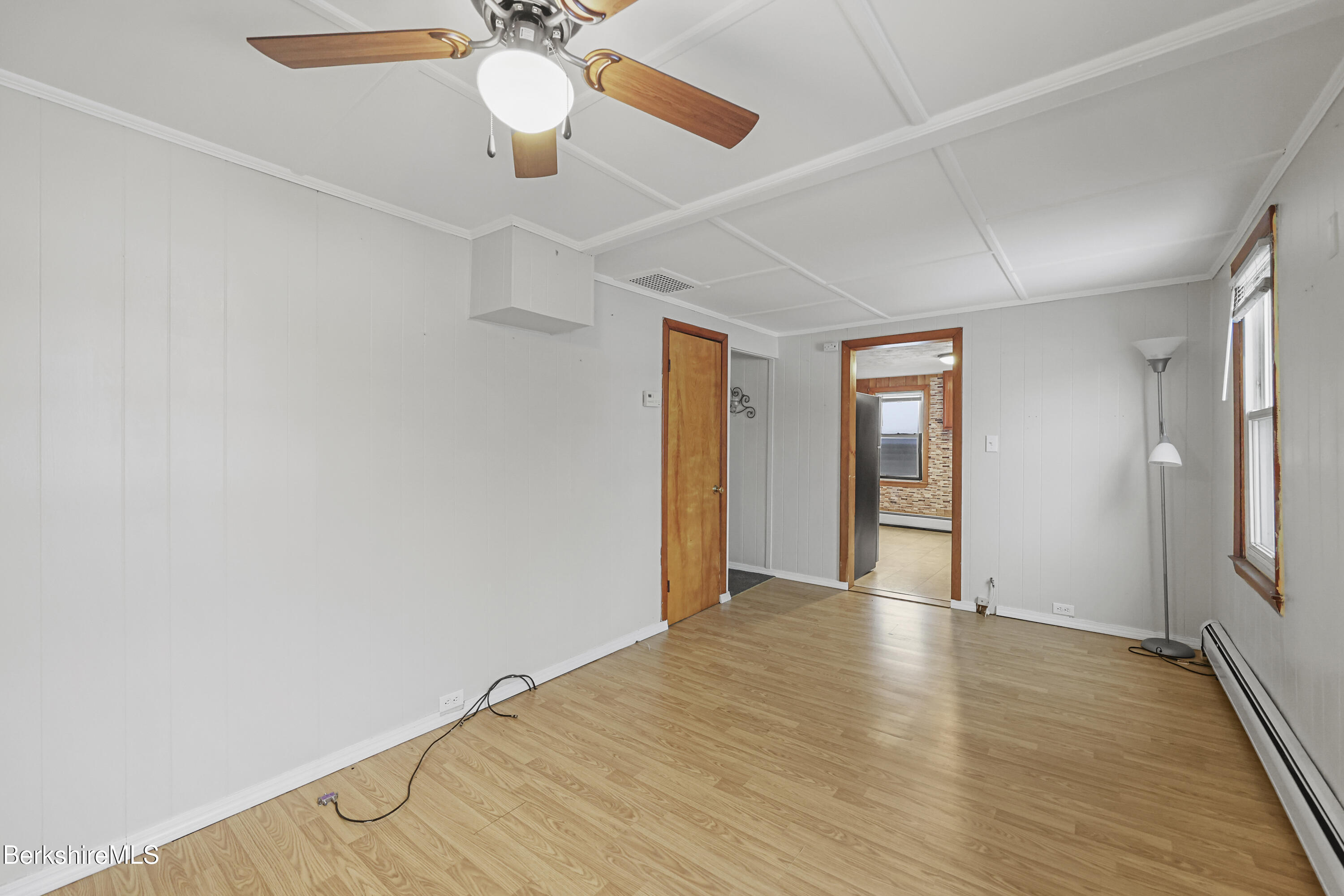 176 North Summer Street Adams, MA 01220 - Photo 17 of 31 a view of an empty room with window and wooden floor