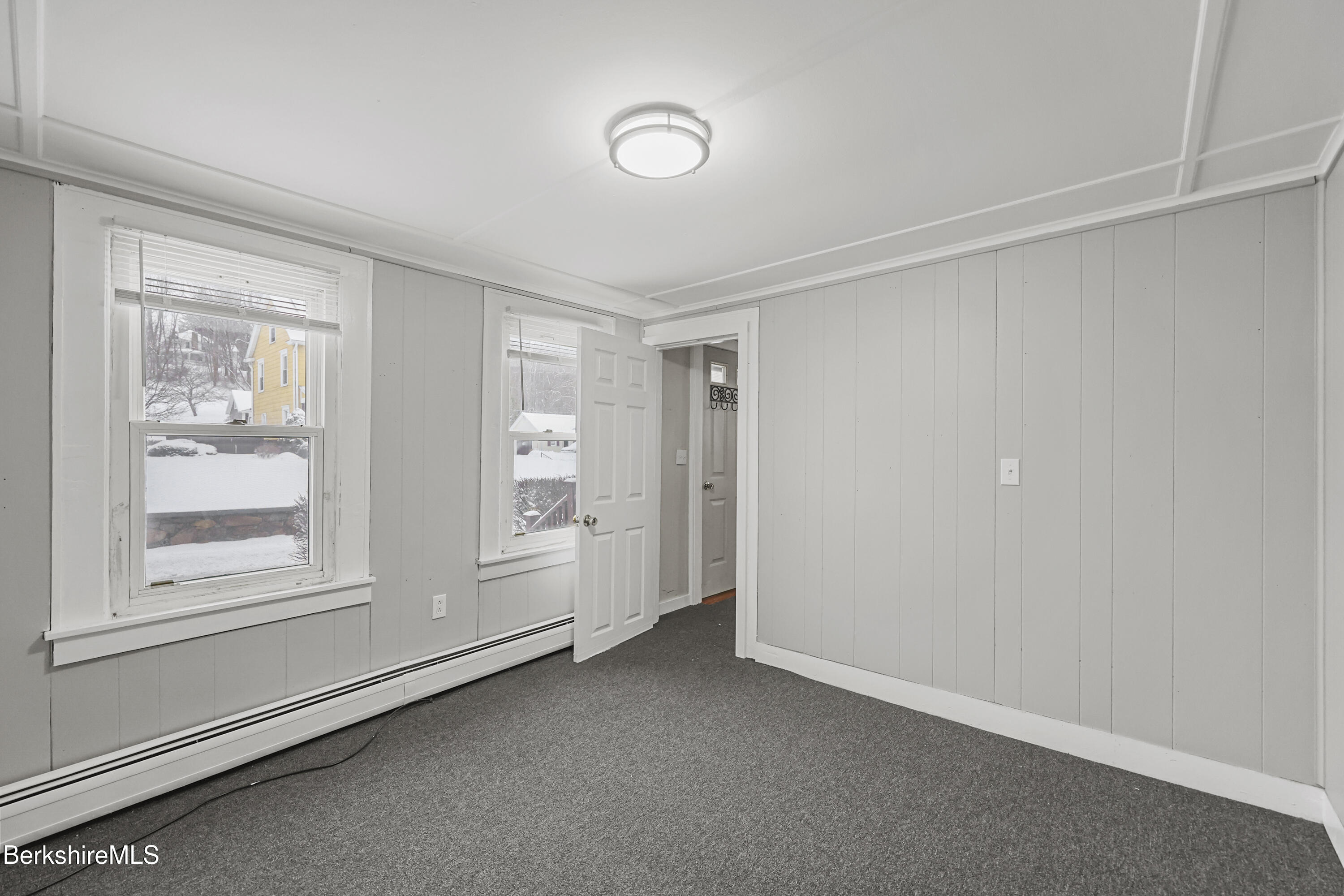 176 North Summer Street Adams, MA 01220 - Photo 19 of 31 a view of an empty room with a window