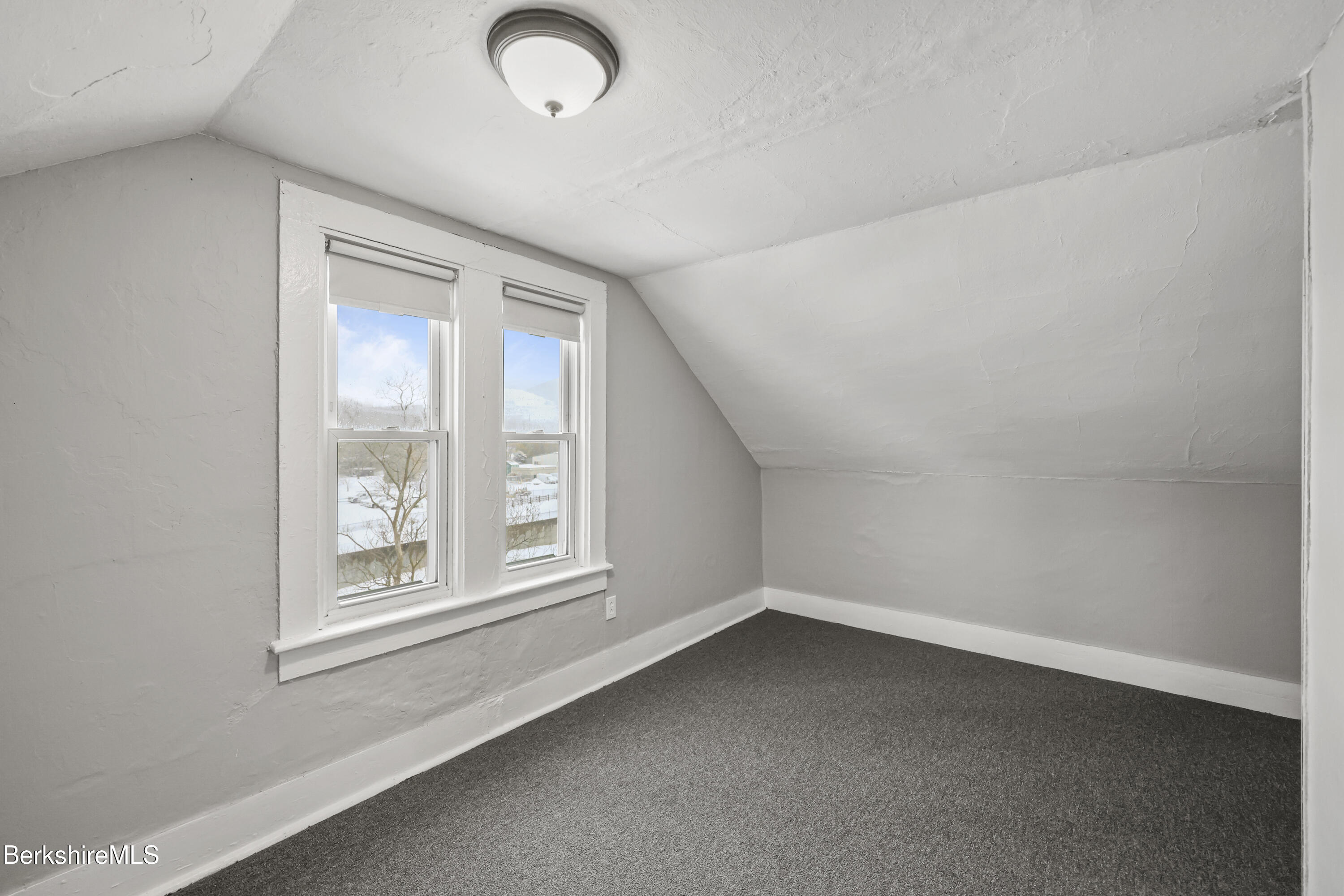 176 North Summer Street Adams, MA 01220 - Photo 22 of 31 an empty room with a window