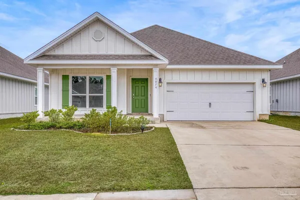 a view of a hallway with wooden floor and closet